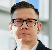 Alexander Hughes, direktør i en kryptohandelsvirksomhed, CEO-portræt
